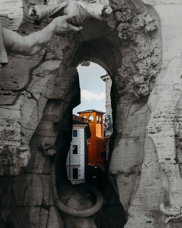 A glimpse of Italian architecture through an ancient sculpture