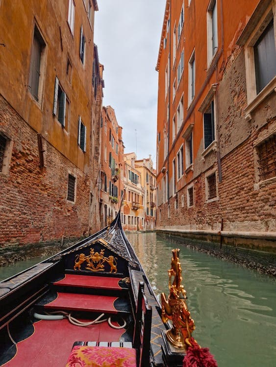 Venetian gondola ride through historic canals